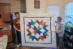 Jackie Whitehead with quilt top she made.
Show and Tell part of meeting. 4/22/26